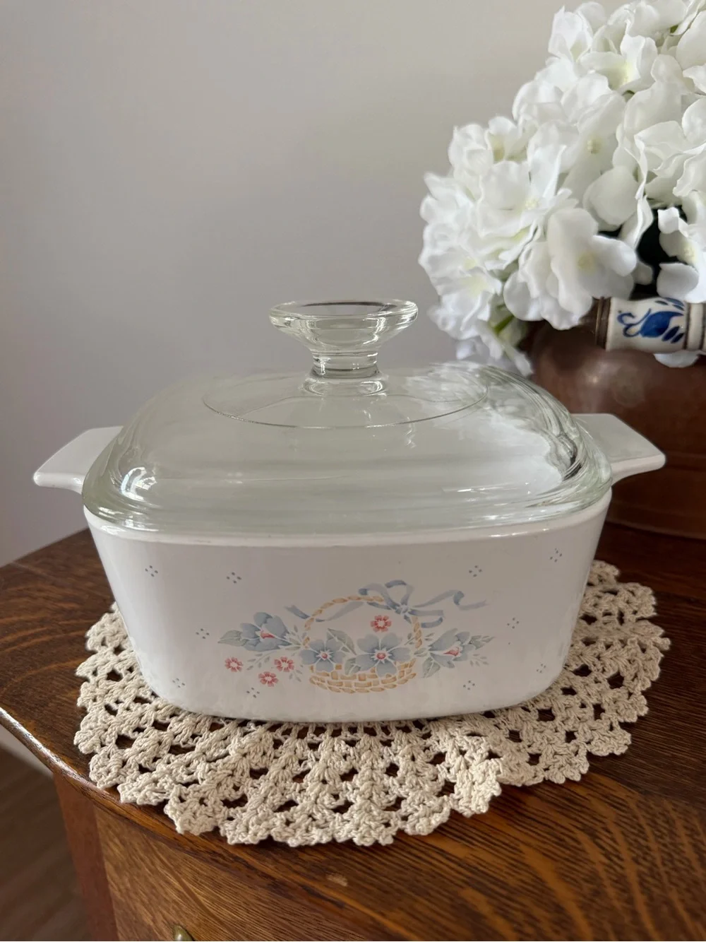 Corningware White Casserole Dish with Floral Basket Motif and Clear Glass Lid